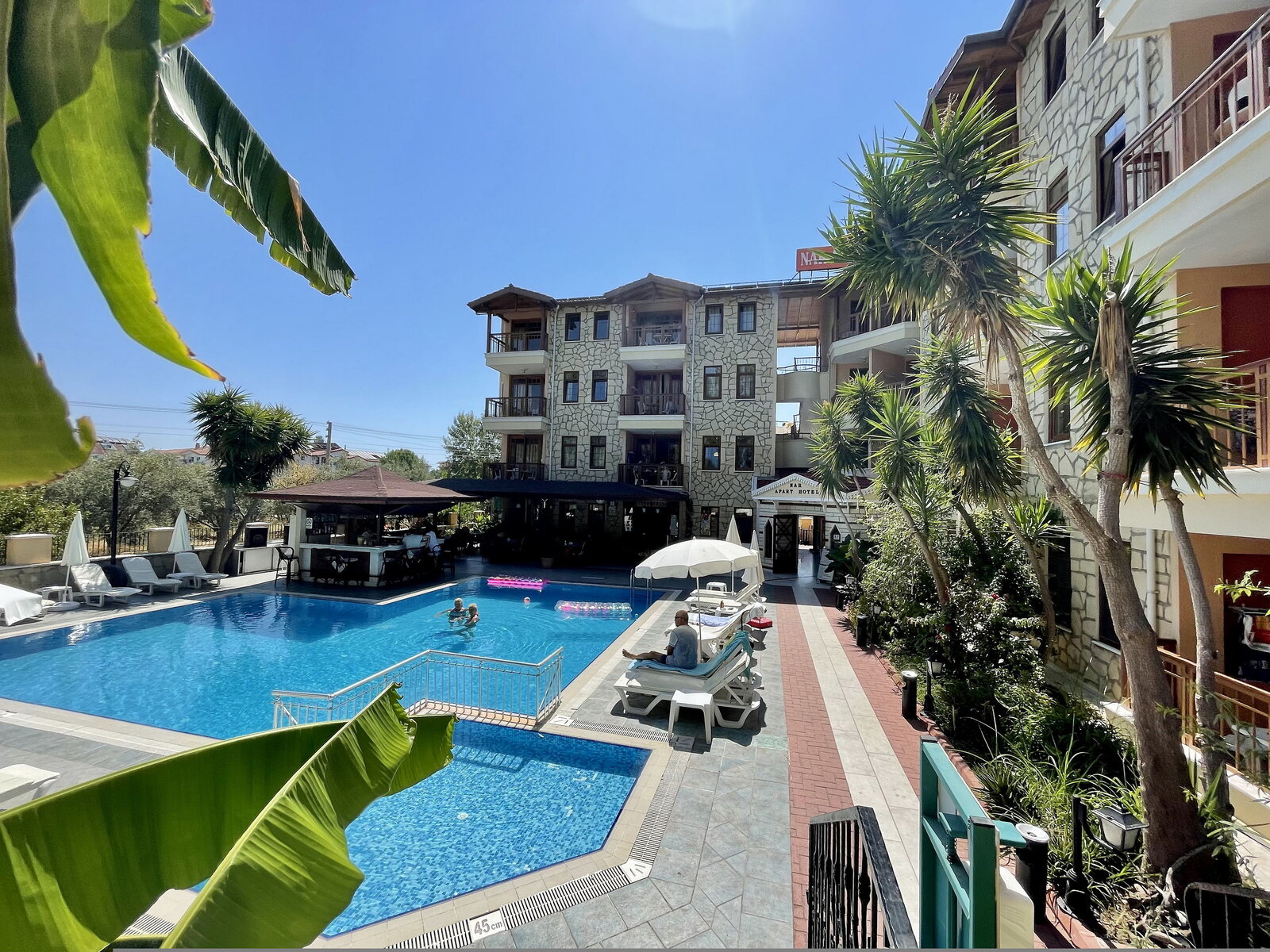 Nar Apart Hotel outdoor pool and garden